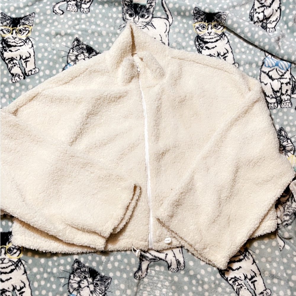 Furry cropped jacket.
